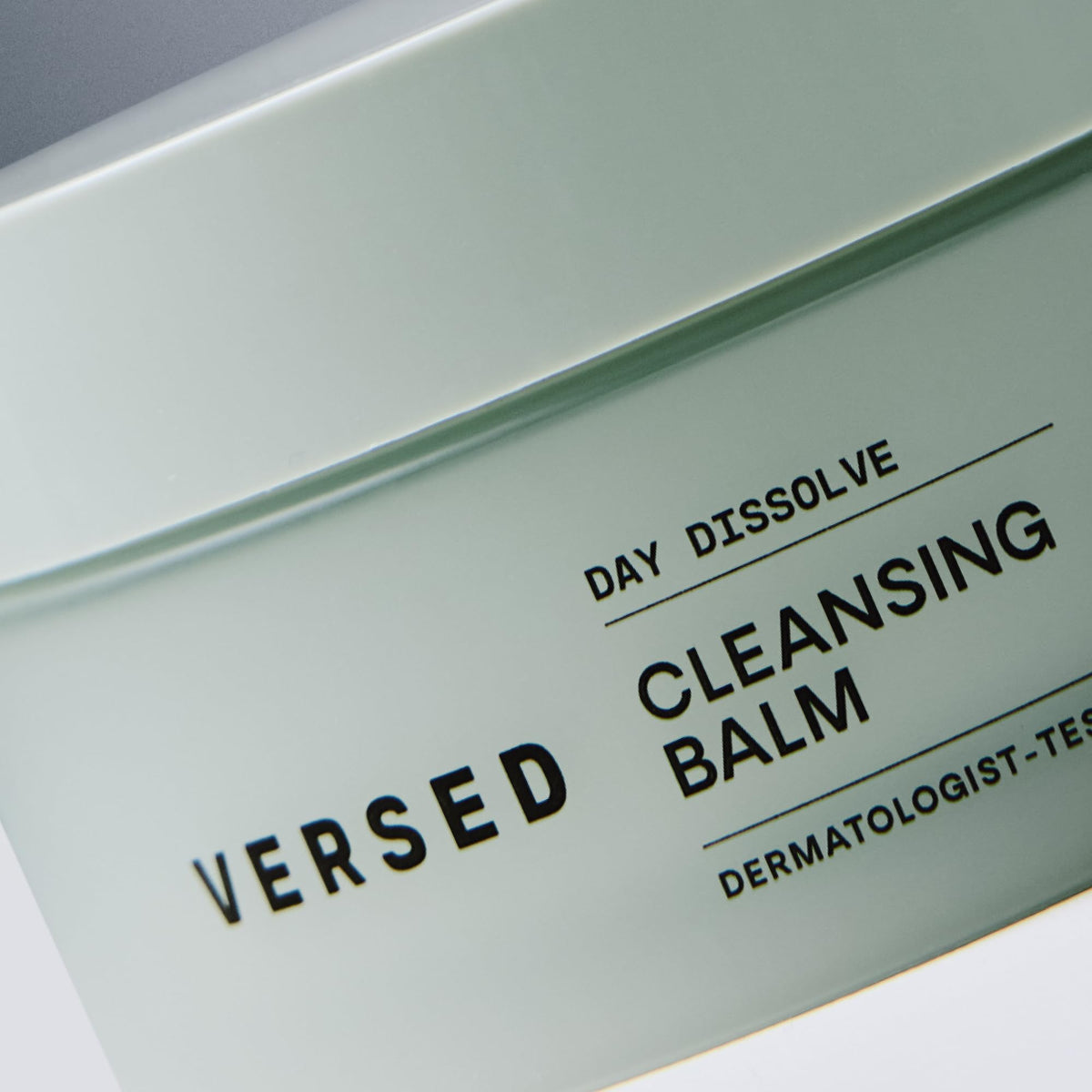 Versed Day Dissolve open jar label view showing clean, vegan formulation