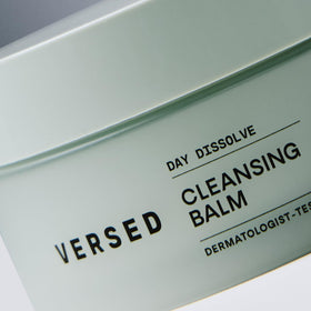 Versed Day Dissolve open jar label view showing clean, vegan formulation