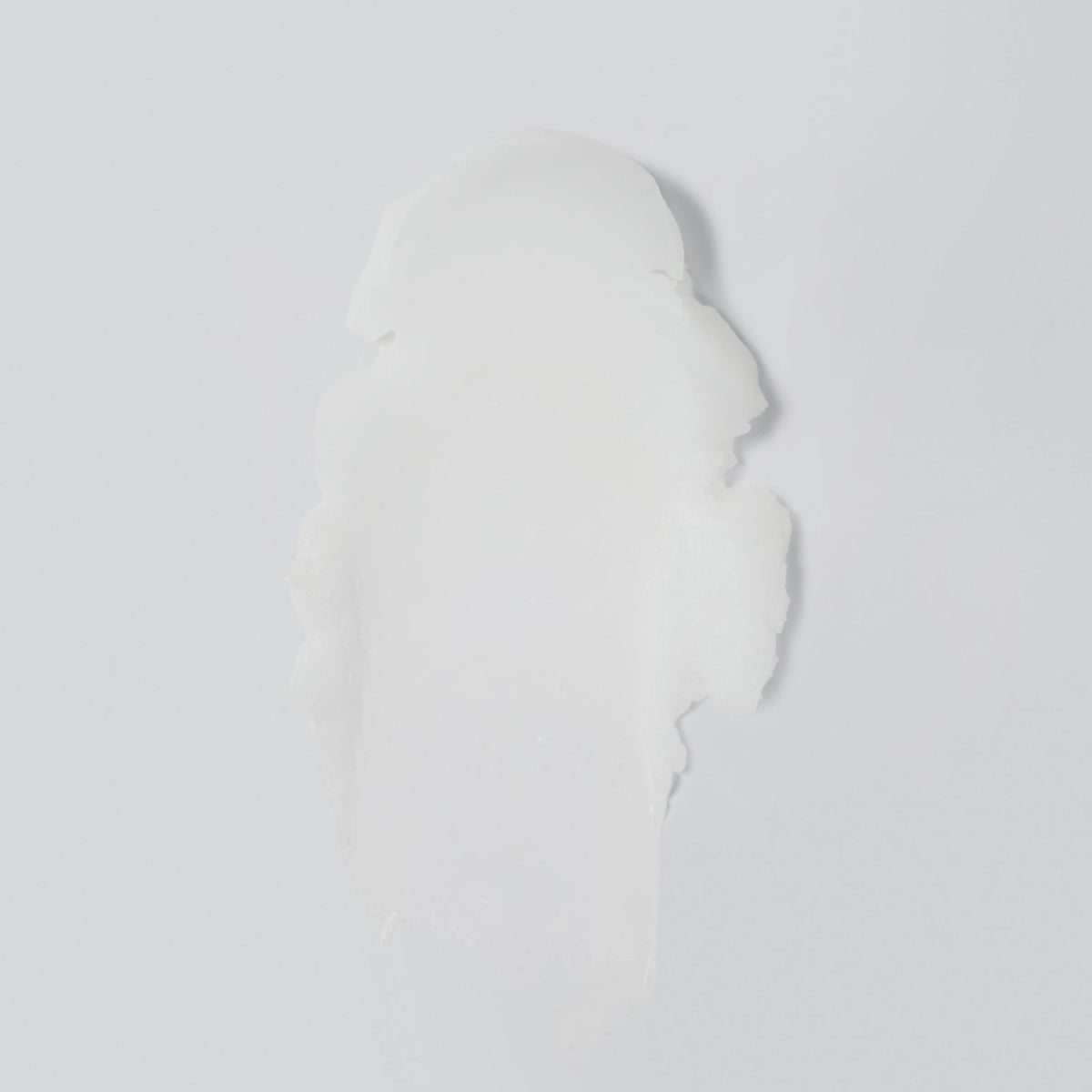 Versed Day Dissolve texture closeup revealing smooth balm melting benefit
