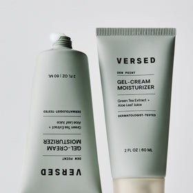 Versed Dew Point jar on bathroom shelf conveying clean, vegan skincare storage