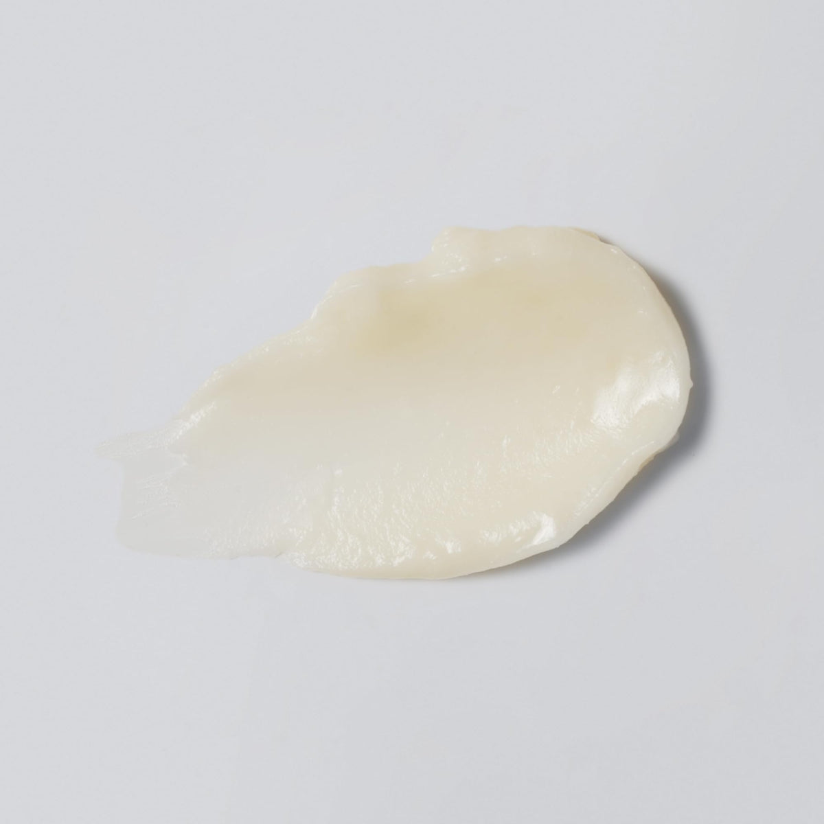Versed open jar texture close-up showing balm consistency and quick-absorbing benefit