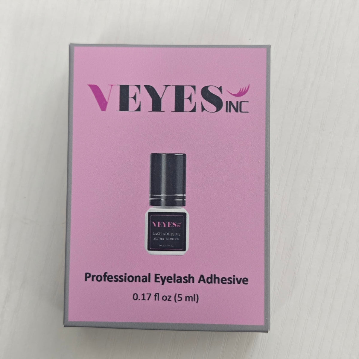 VEYES INC workstation setup with adhesive emphasizing organized, efficient service