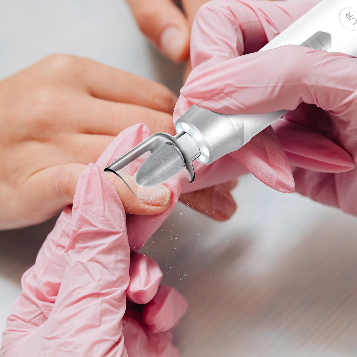 VFD in use during pedicure on feet showing callus care and thicker nail support