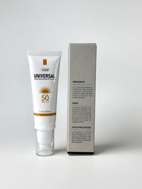 VGO tube beside a coin to show 50ml scale and convenient portability