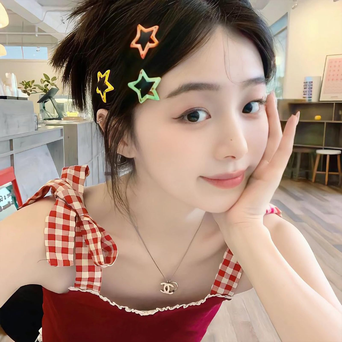 VIBILIA star clips holding bangs back to show makeup and skincare convenience