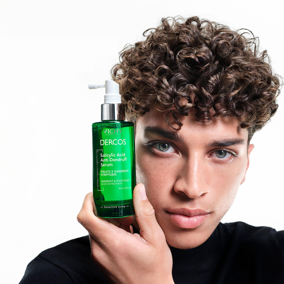 Vichy Dercos serum pipette delivering product to scalp for precise targeted application