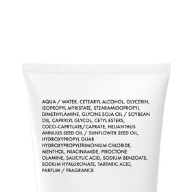 VICHY Dercos bottle next to everyday objects to illustrate 6.7 fl oz travel-friendly size
