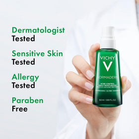 VICHY Normaderm held in hand for scale showing compact, travel-friendly size