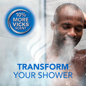 Vicks tablet dissolving on shower floor releasing steam and scent