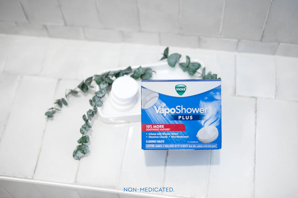 Vicks evening bathroom scene with tablet creating a calming steam ritual