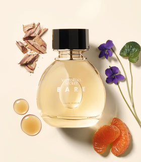 Victoria's Secret bare spray in use on wrist, demonstrates application and light sillage