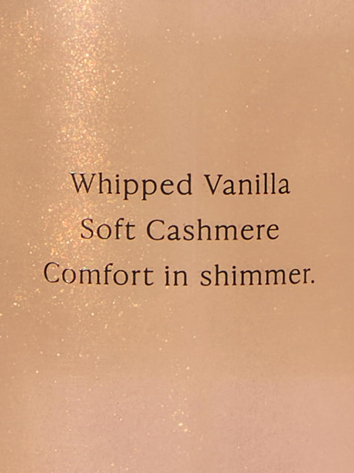 Victoria's Secret bottle next to matching lotion showing layering for longer-lasting fragrance