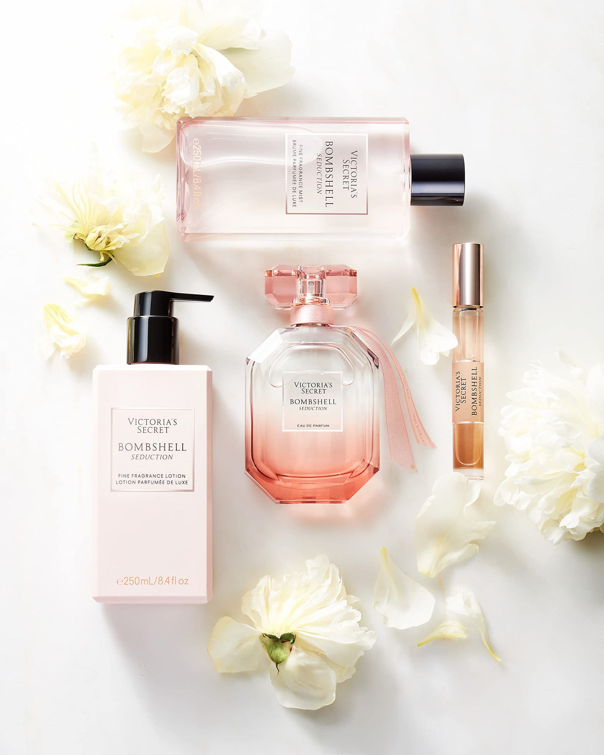 Victoria's Secret perfume with matching lotion to show layering benefit: longer lasting fragrance