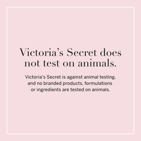 Victoria's Secret bottle held in hand to show 8.4 fl oz scale and portability advantage