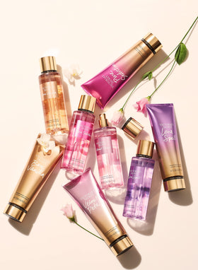 Victoria's Secret mist spraying in air demonstrating fine veil of fragrance