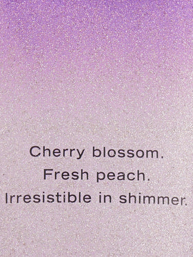 Victoria's Secret pump and label detail of Love Spell shimmer lotion for easy dispensing