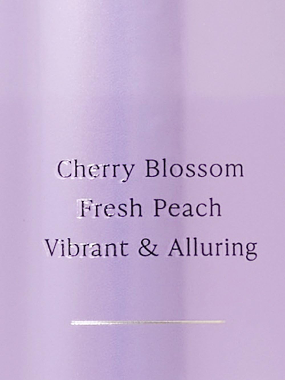 Victoria's Secret Love Spell mist on skin illustrating lightweight, non-greasy finish