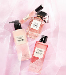 Victoria's Secret Tease bottle in hand demonstrating 8.4 oz size