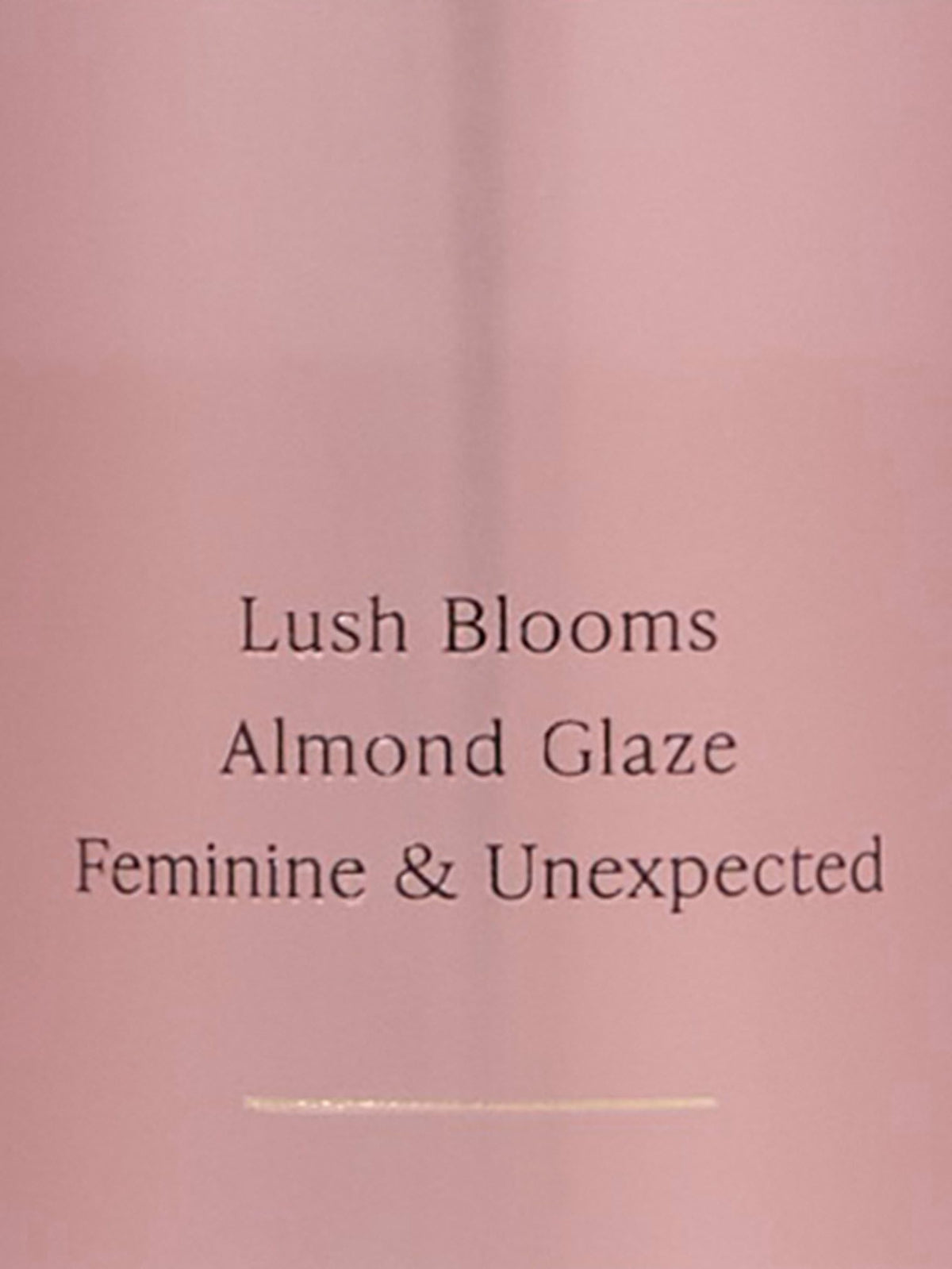 Victoria's Secret Velvet Petals bottle texture detail, emphasizes luxurious finish and grip
