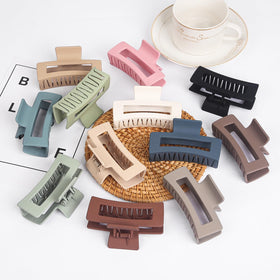 Vigorpace clip holding a bun showing comfortable all-day wear