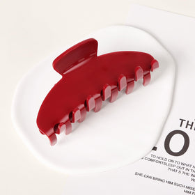 Vigorpace size comparison next to hand showing 4-inch scale and travel-friendly benefit