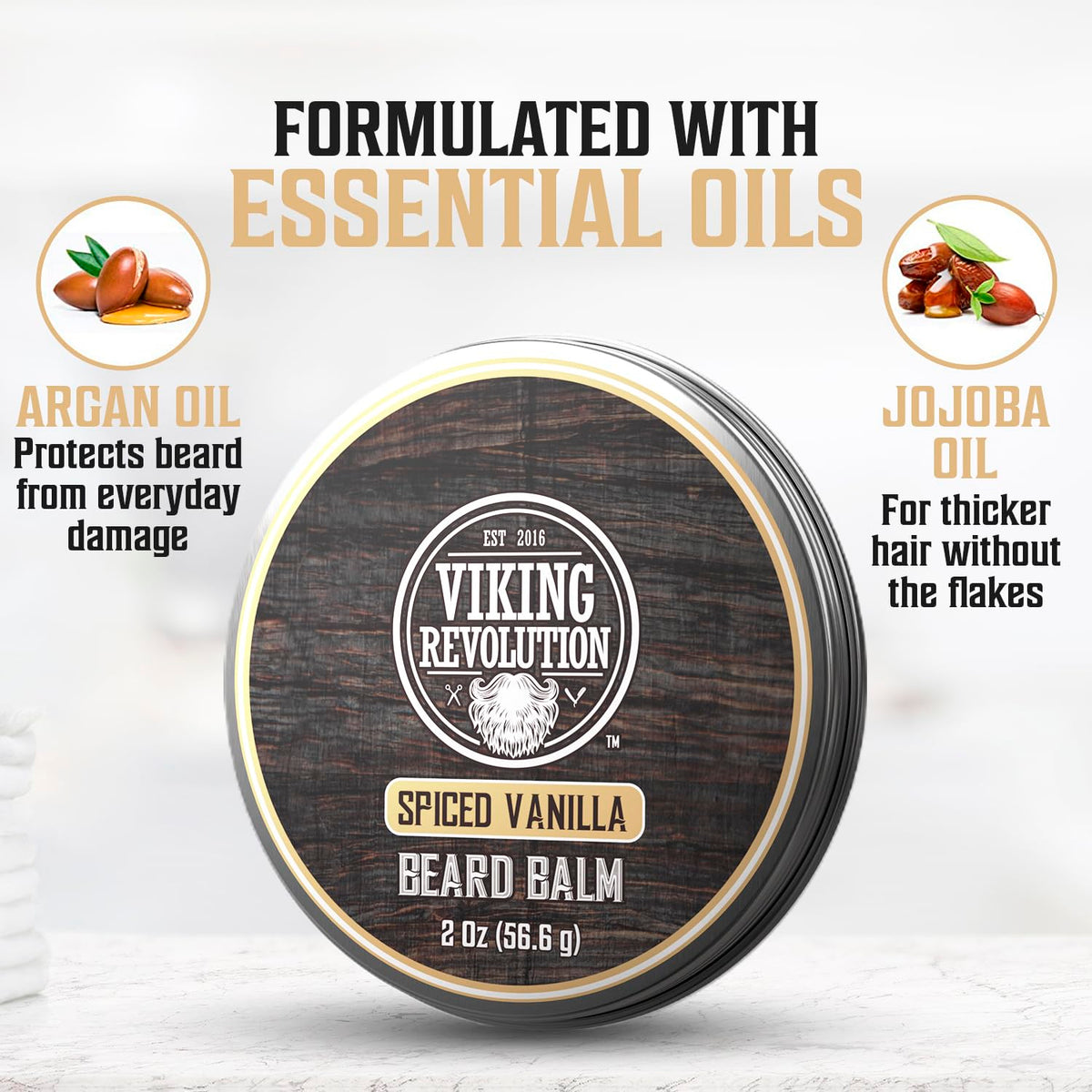 Viking Revolution balm being warmed in hands demonstrating easy spreadability and application benefit