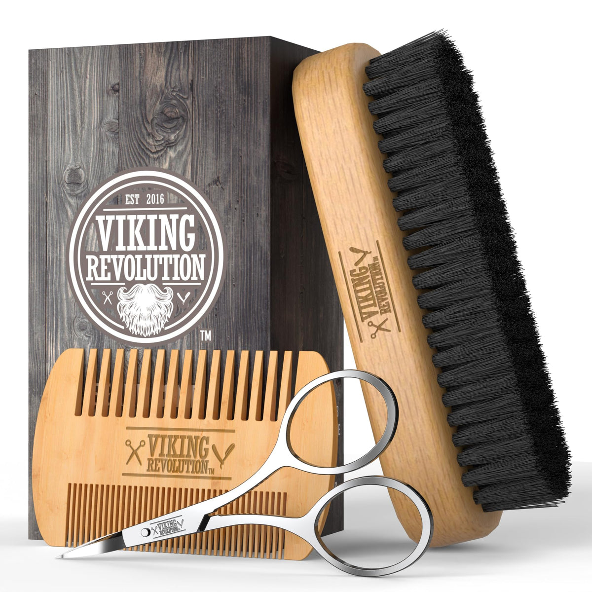 Viking Revolution comb and brush next to beard oil for even product application