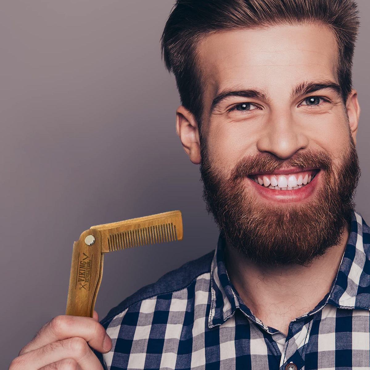 Viking Revolution comb used while applying beard oil, evens product distribution