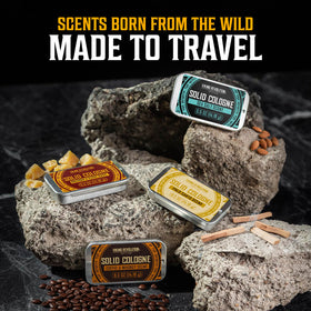 Viking Revolution lifestyle outdoor use showing a man applying cologne while hiking benefit: rugged, on-the-go scent