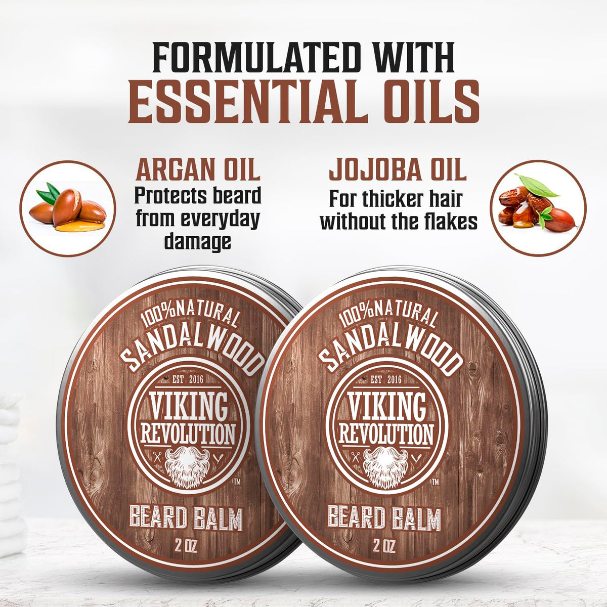 Viking Revolution hands applying balm to fingertips to show easy warming and absorption