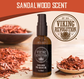 Pre-shave oil on bathroom tray with grooming tools, conveys organized shaving routine benefit