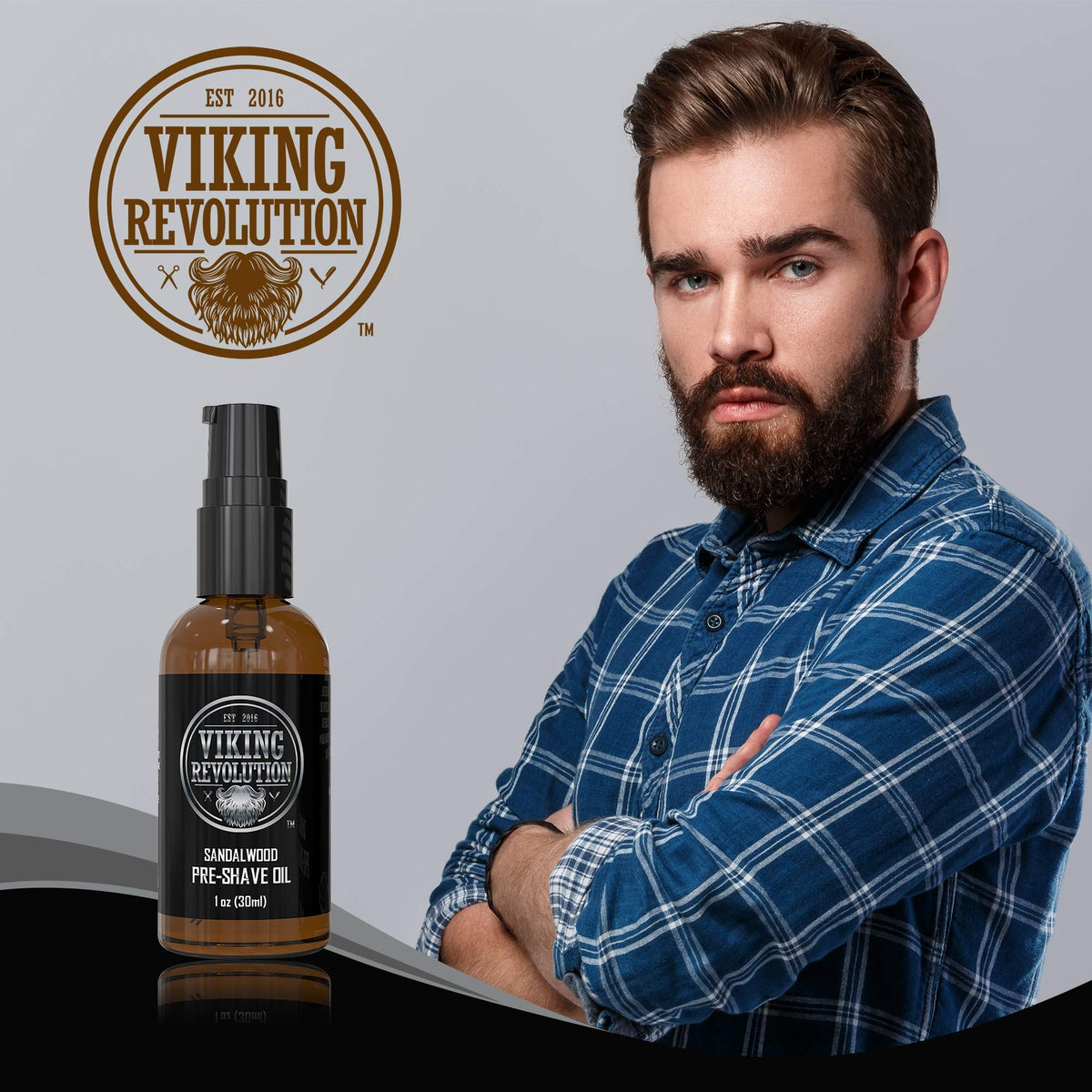 Application image of Viking Revolution oil in hand, shows easy dispensing for few drops