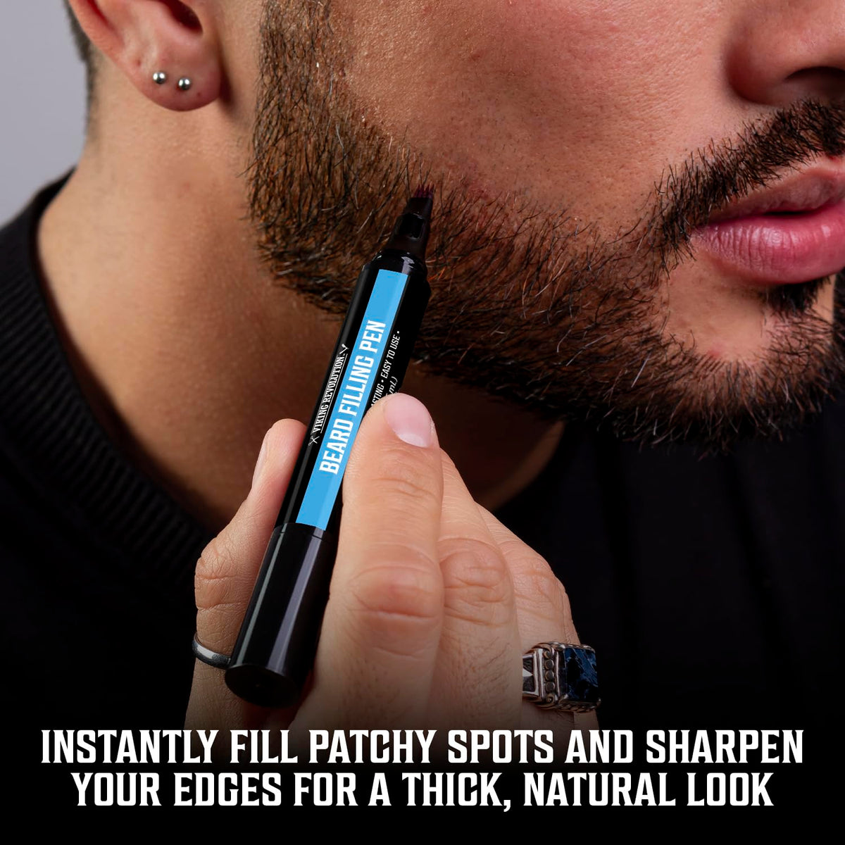 Viking Revolution beard oil drop on palm showing texture benefit: lightweight conditioning without grease