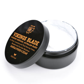 Vikings Blade applied on face with razor showing slick layer for comfortable, close shave
