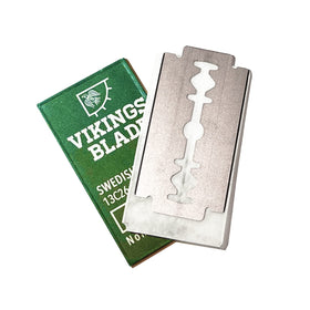 Vikings Blade double-wrapped blades beside ruler showing safe handling and compact size