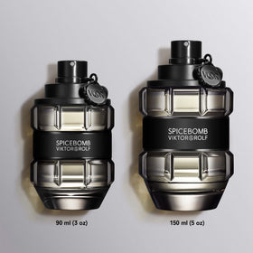 Viktor&Rolf Spicebomb held in hand for scale to show 3.04 fl oz size and portability