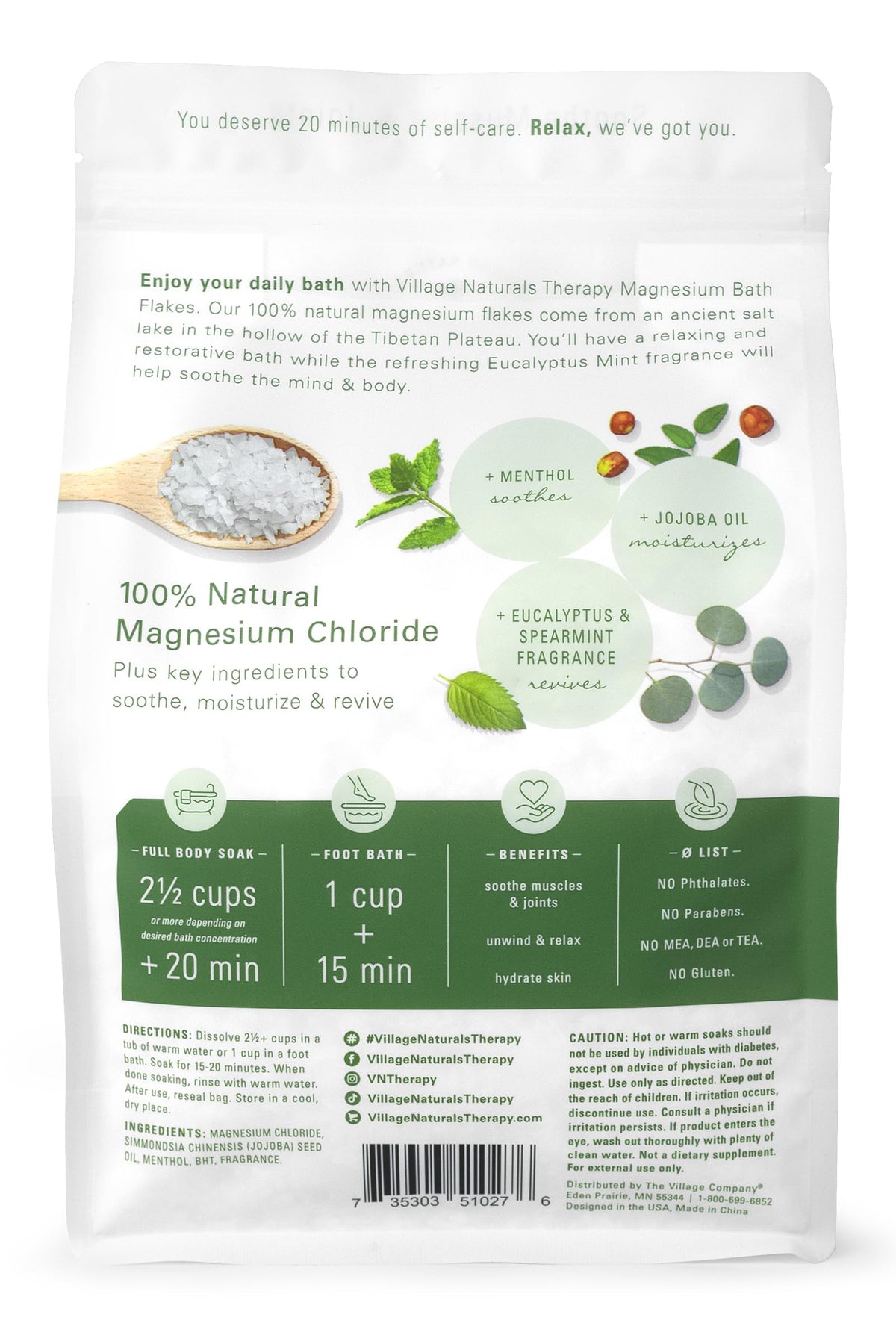 Village Naturals close-up of white magnesium bath flakes, fast dissolving