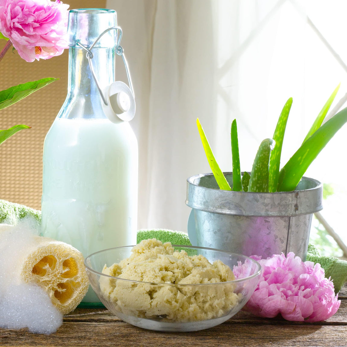 Village Naturals bath scene with filled tub suggesting relaxing, aromatic soak benefit