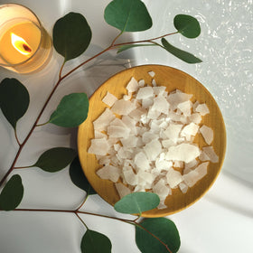 Village Naturals 2.5 lb container beside a towel to show size and value