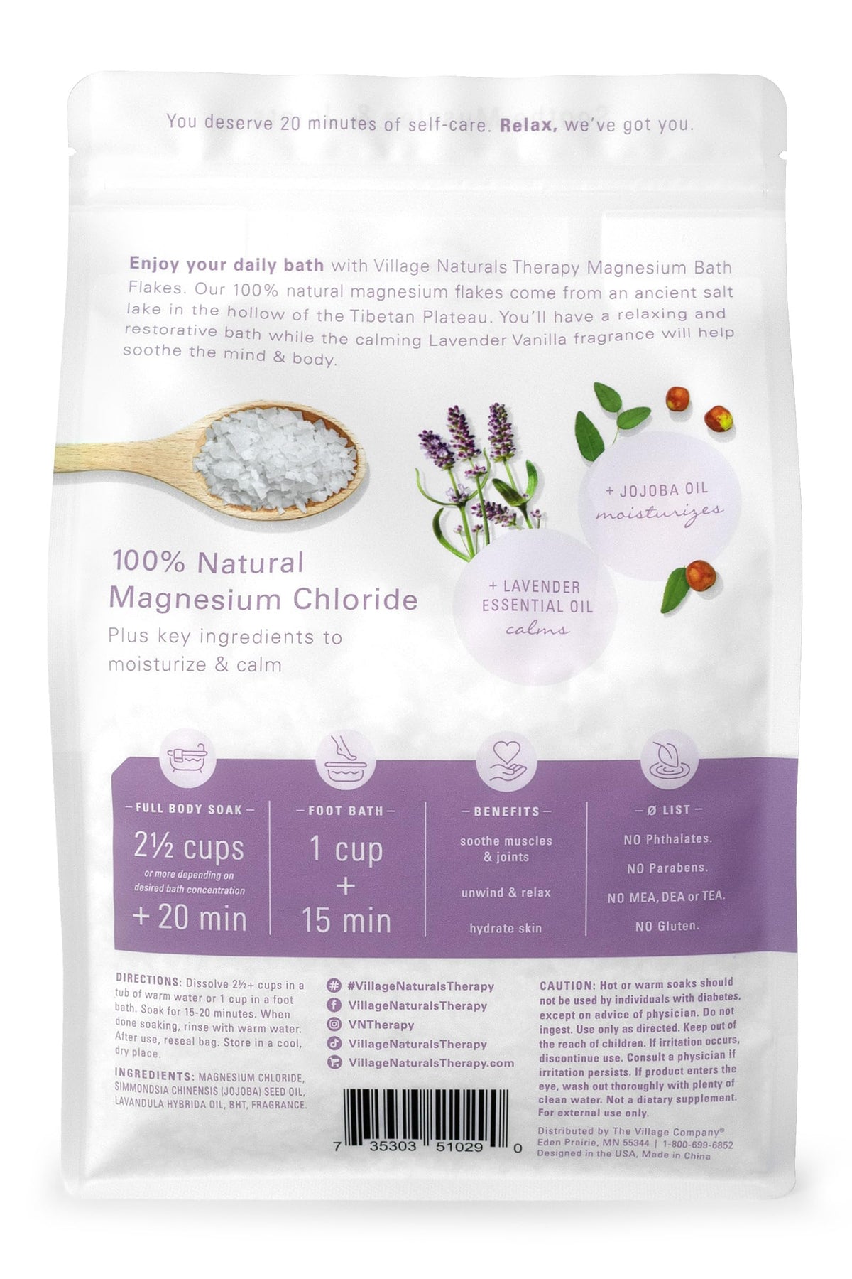 Village Naturals Therapy open jar with visible magnesium flakes texture