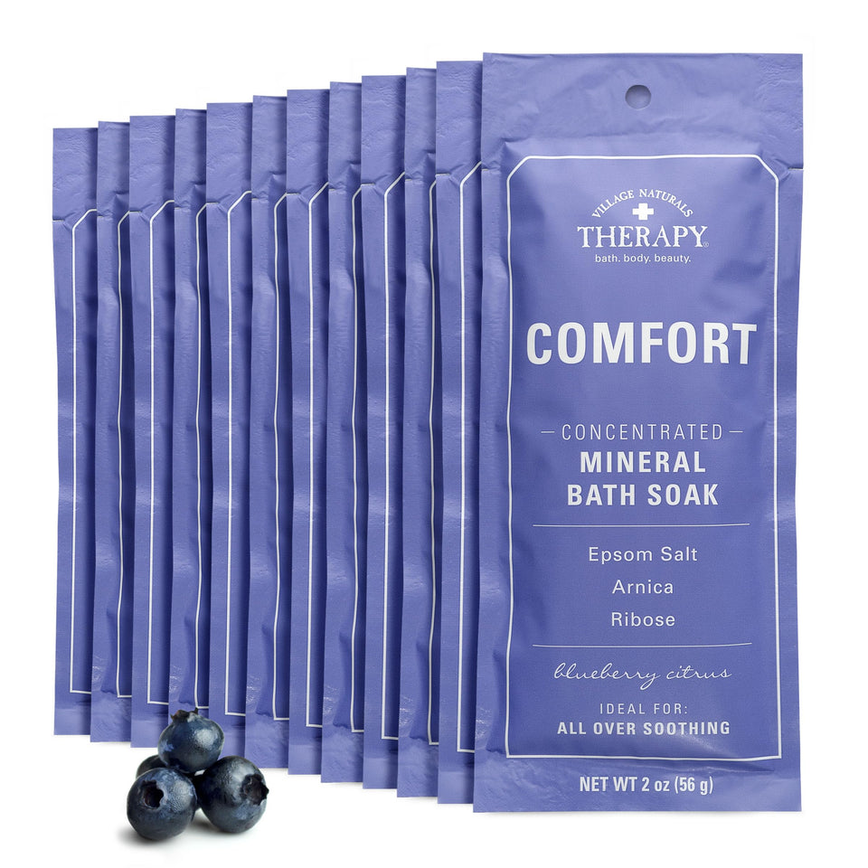 Village Naturals Therapy front packaging showing blueberry citrus packets and benefits