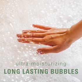 Village Naturals Therapy used in shower on a pouf for cooling, invigorating cleanse