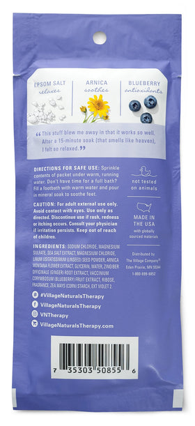 Close-up of Village Naturals Therapy single-use packet highlighting portable convenience
