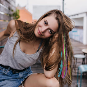 Vin Beauty extensions in hair during party showcasing bold playful color