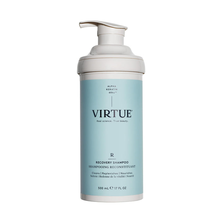 VIRTUE front bottle shot showing label and benefit of rebuilding hair