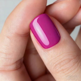 Vishine polish being cured under LED lamp showing fast cure benefit