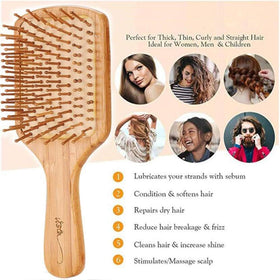 Vista brush in use on curly hair demonstrating tangle removal and minimized frizz