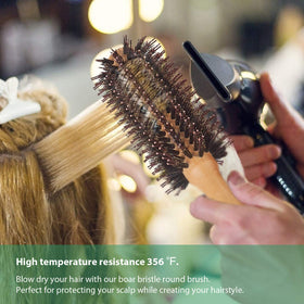 Vista size scale hand comparison showing compact, travel-friendly brush