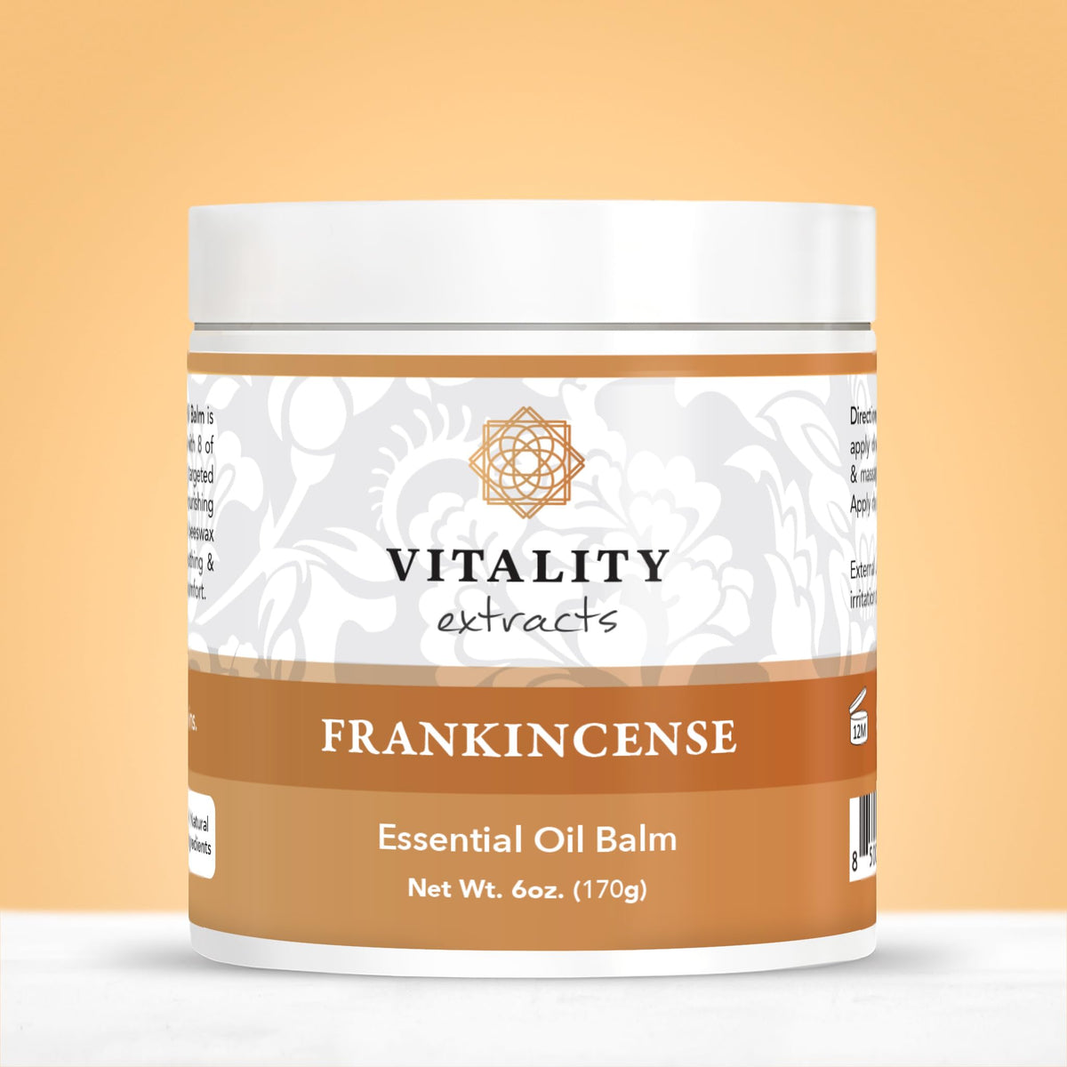 Vitality Extracts balm on bathroom shelf beside towel, suggests daily self-care ritual