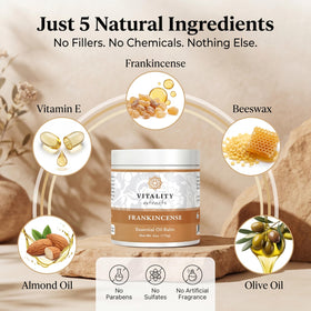 Vitality Extracts balm open texture close-up melting on fingertip, demonstrates spreadability